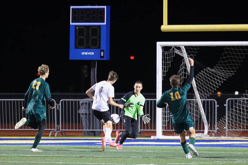 Coal City goalkeeper Carter Nicholson makes a save as Williamsville's Aiden Morgan approaches during the Coalers' 1-0 victory over Williamsville in the IHSA Class 1A Maroa-Forsyth Super-Sectional on Monday, Nov. 3, 2025.