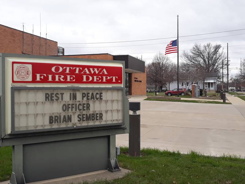 The Ottawa fire and police departments remember Ottawa Police officer Brian Sember on Monday, April 4, 2022, with a message and the American flag at half staff.