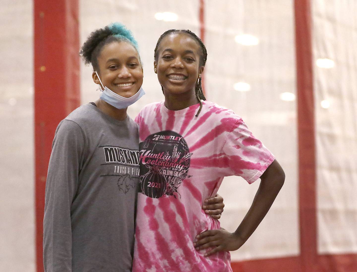 Sisters Dominique and Alex Johnson on Monday, April 4, 2022, during track practice at Huntley High School The sisters are among the best long and triple jumpers in the state. Alex won long jump and Dominique won the triple jump at the indoor state meet this year.