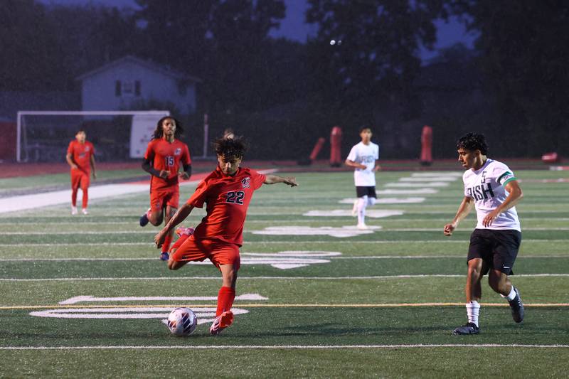 Bradley-Bourbonnais' Ixchmel Montoya crosses the ball ahead of Bishop McNamara's Diego Perez during the Boilermakers' 9-0 victory over Bishop McNamara in an All-City match up on Wednesday, Sept. 3, 2025.