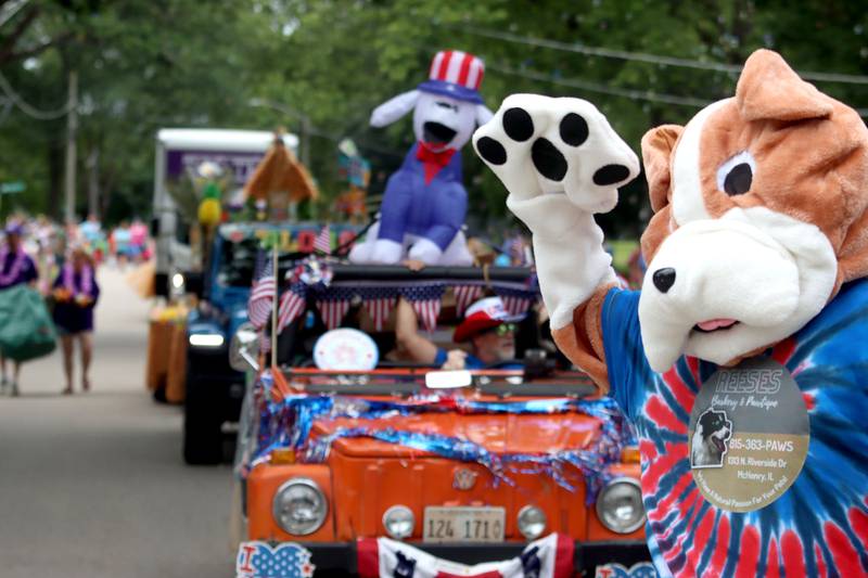 The group from Reese’s Barkery and Pawtique takes part in the Fiesta Days Parade down Main Street in McHenry on Sunday, July 20, 2025.