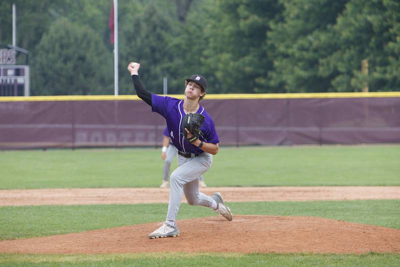 Downers Grove North's Nick Konopiots delivers a pitch against Waubonsie at the Class 4A Sectional Final on Saturday, June 7, 2025 in Lockport.