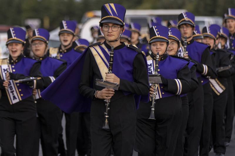 Members of the Mendota High School Marching band make their way to the field playing their fight song prior to the start of the game against Sherrard High School at Mendota High School on September 27, 2024.