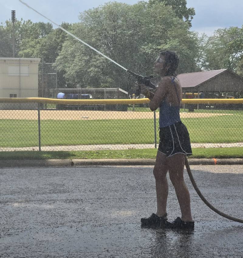 Emily Konczak competes in the water fights Saturday, Aug. 3, 2024, during Granville Days at Hopkins Park.
