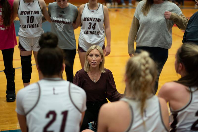 Montini’s head coach Shannon Spanos talks to her players during the 3A Glenbard South Sectional basketball final against Providence at Glenbard South High School in Glen Ellyn on Thursday, Feb 23, 2023.
