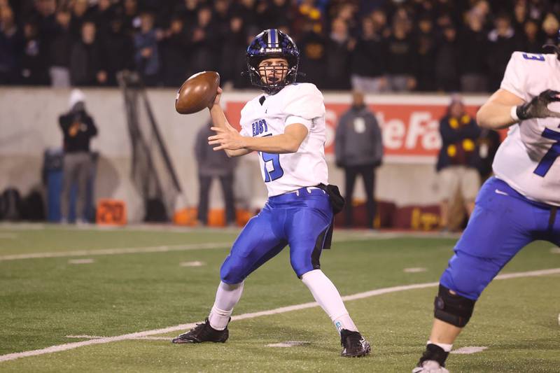Lincoln-Way East’s Braden Tischer looks to pass against Loyola in the Class 8A championship on Saturday, Nov. 25, 2023 at Hancock Stadium in Normal.