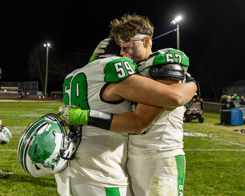 Alex Ortiz (59) of Dwight hugs brother Filemon Ortiz (57) after playoff loss to Stockton on Saturday, November 15, 2025 at John O' Boyle Field in Stockton.
