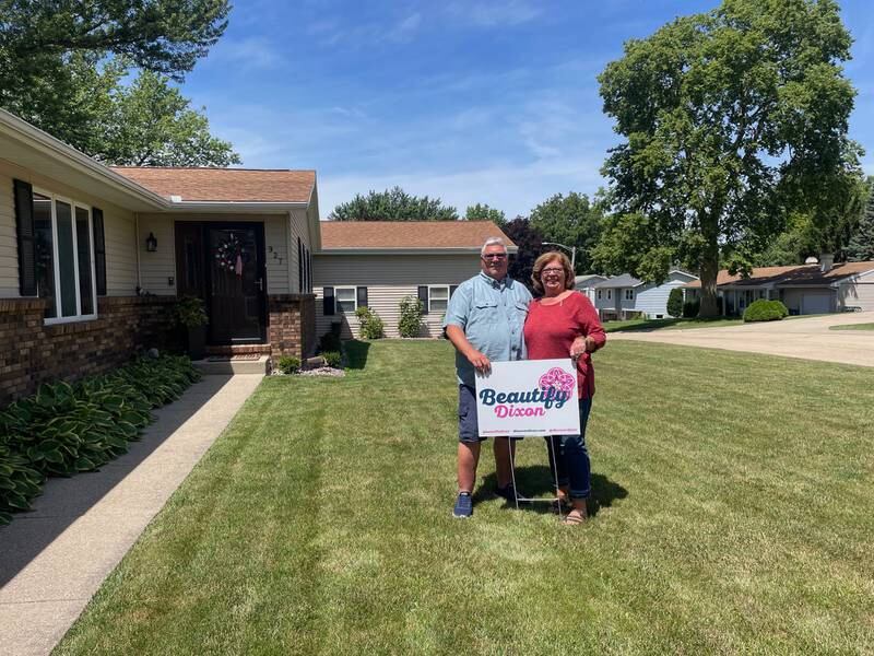 The home of Bob (left) and Shawney Evans (right) was selected as one of the four June honorees of the Beautify Dixon recognition program.