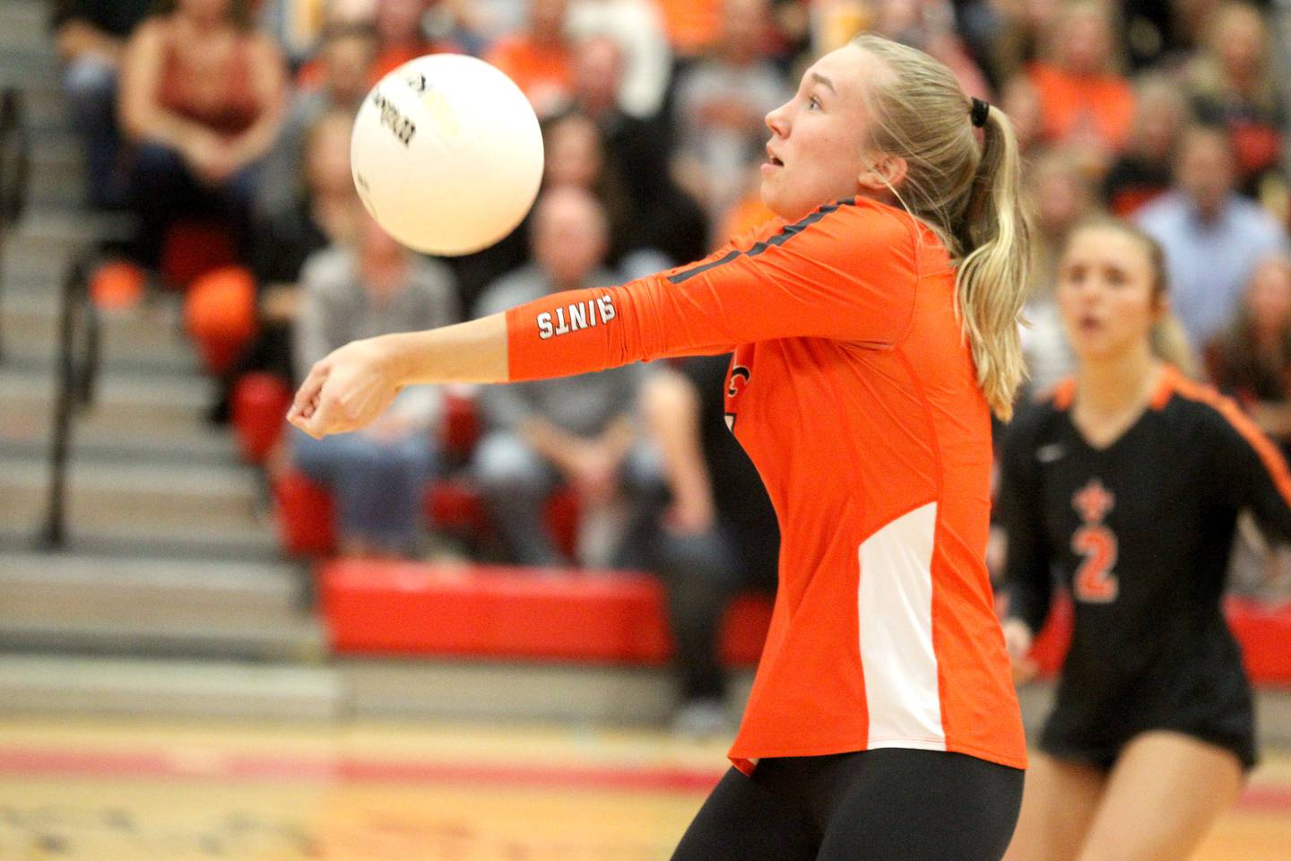 St. Charles East’s Lia Schneider returns the ball during a Class 4A Hinsdale Central supersectional against Loyola Academy on Friday, Nov. 4, 2022. St. Charles East won 25-22, 25-18.