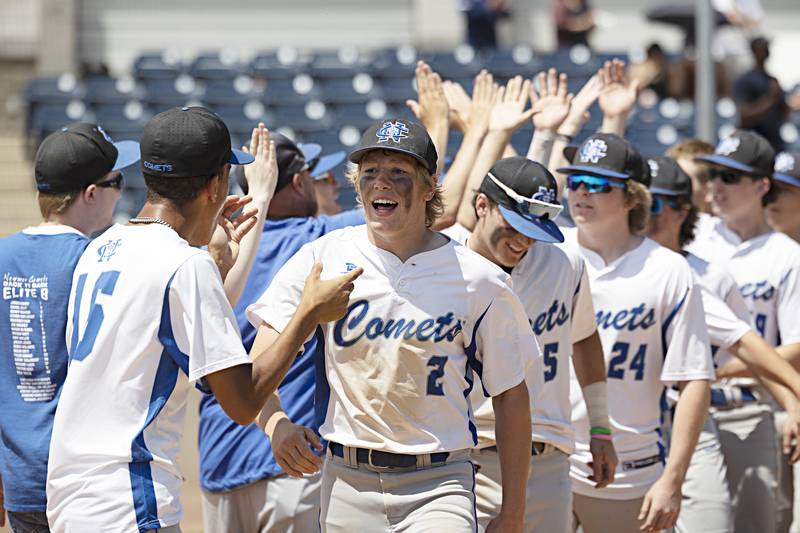 Newman celebrates their 3-2 supersectional baseball game against Chicago Hope Monday, May 29, 2023. Newman will play next week in Peoria for the class 1A state title.