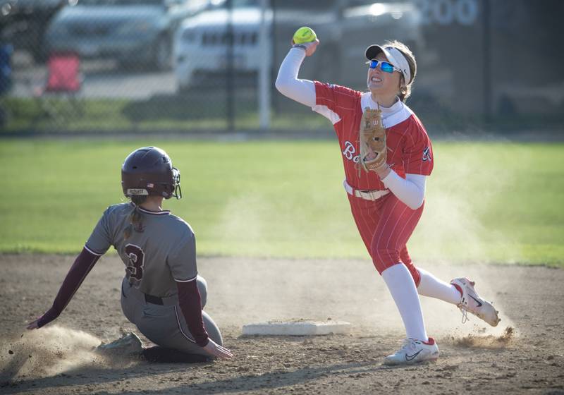 Bradley-Bourbonnais' Shannon Lee, right, forces out Lockport's Marcy Curry at second base and throws on to first to complete a double play in the fourth inning of Thursday's game.