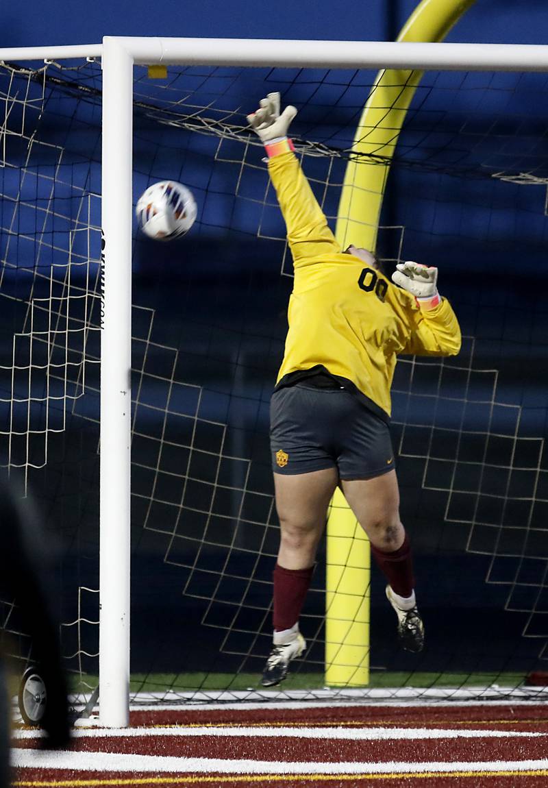 The ball gets past Richmond-Burton goalkeeper Taylor Labay during a non-conference girls soccer match against McHenry Thursday, March 16, 2023, at Richmond-Burton High.