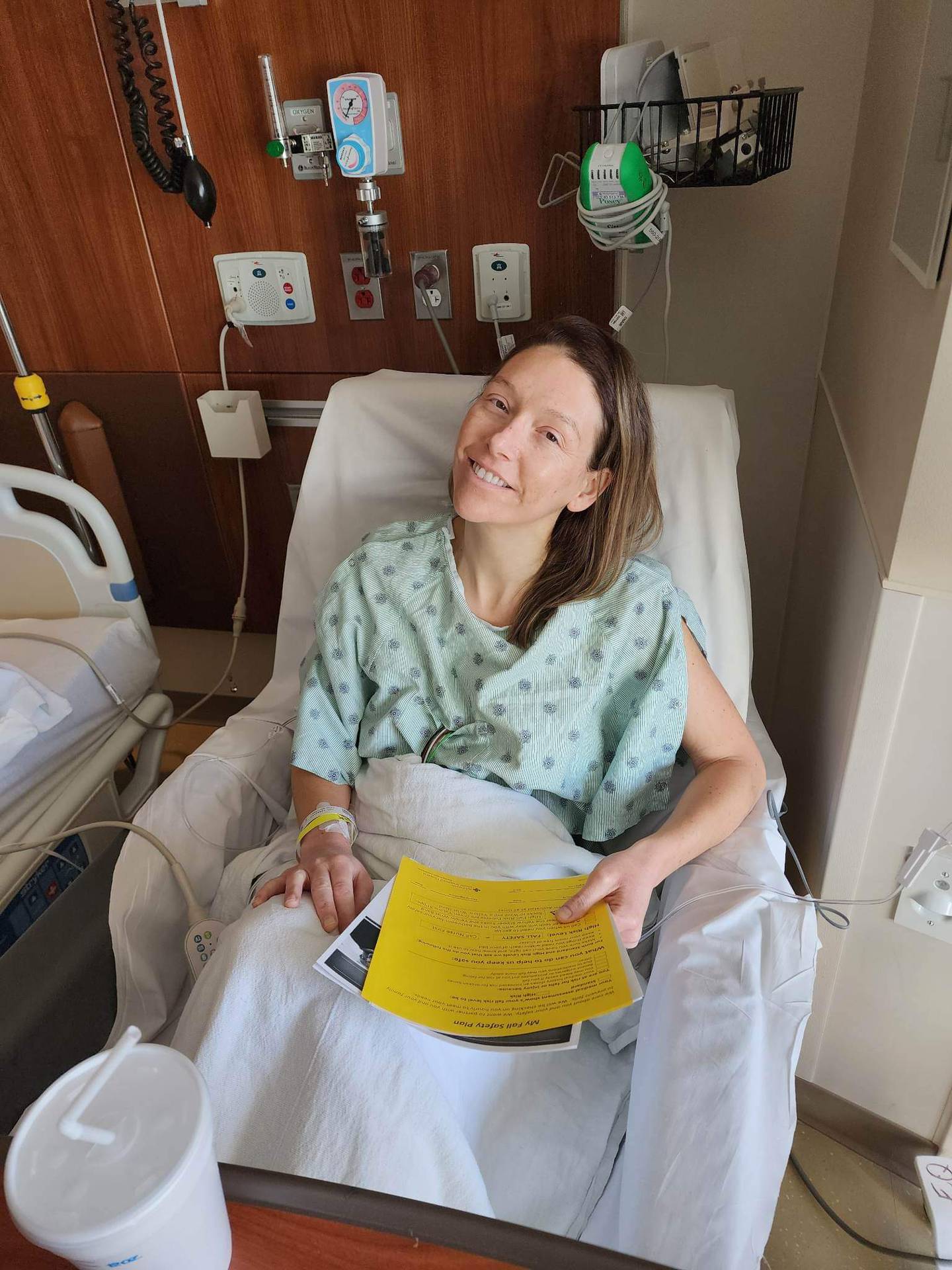 Colorectal cancer survivor Dana Borror of Crystal Lake is seen during one of her hospital visits. Borror, now 41, was diagnosed with stage 3 colon cancer at 41 after two years of symptoms.
