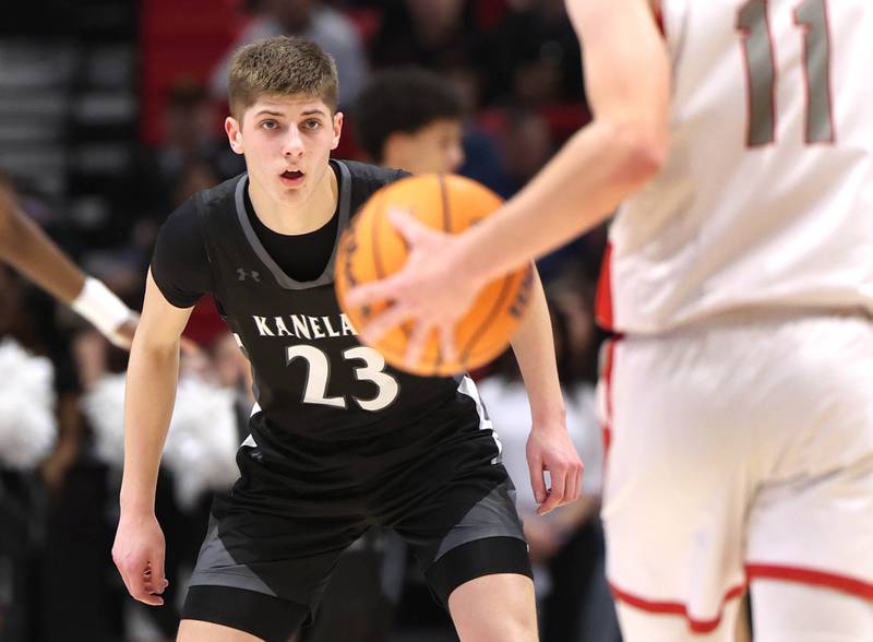 Kaneland's Connor Kimme plays defense against Morton's Owen Adams Monday, March 9, 2026, during their IHSA Class 3A supersectional matchup in the Convocation Center at Northern Illinois University in DeKalb.