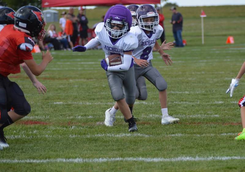 Rochelle's Emmitt Putzstuck runs for a first down during a sixth-grade junior tackle football game with Stillman Valley on Sunday, Sept. 7, 2025. Rochelle won the game 30-0.