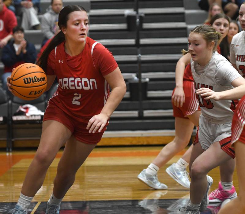 Oregon's Avery Kitzmiller dribbles the ball against Stillman Valley at the 2A Winnebago Regional on Monday, Feb. 16, 2026 at Winnebago High School.