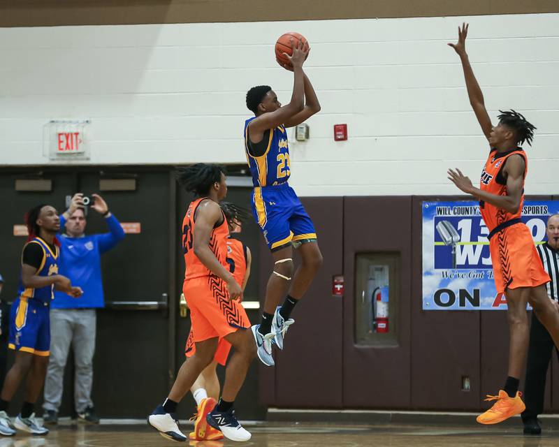 Joliet Central's Danny Thompson (23) shoots a jump shot in the WJOL Tournament Championship game. Nov 25, 2023.