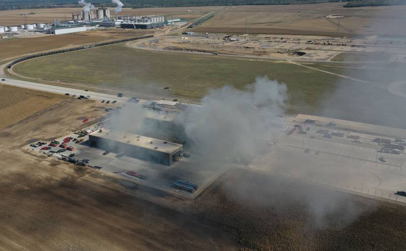 Smoke billows from Marquis Energy as firefighters work to control a structure fire on Wednesday, Oct. 8, 2025 in Hennepin. The fire was upgraded to a 5th alarm dispatching the (MABAS) Mutual Aid Box Alarm System. The fire broke out around 11a.m.