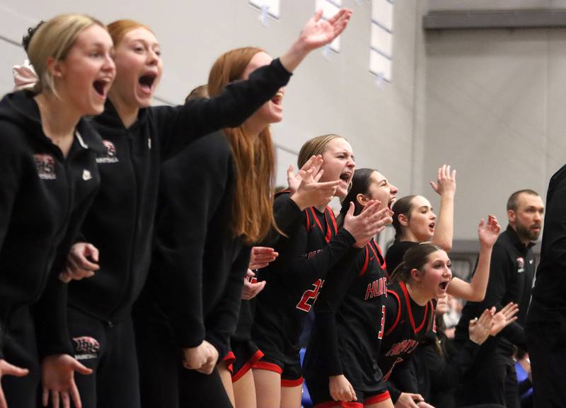 Huntley’s Red Raiders get revved up as they build a second-half lead over the host Rockets of Burlington Central in varsity girls basketball on Monday, Feb. 9, 2026, at Central High School in Burlington.