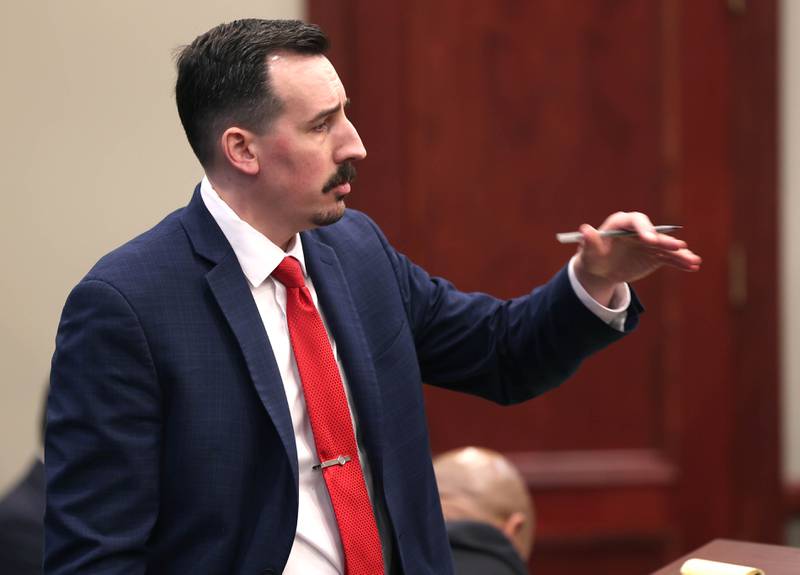 Special prosecutor Derek Dion asks questions of Hamza Khatatbeh, 17, formerly of Sycamore, as he testifies in his own defense Thursday, Feb. 19, 2026, during the second day of Khatatbeh’s murder trial at the DeKalb County Courthouse in Sycamore. Khatatbeh is accused of fatally stabbing Sycamore 17-year-old Kaleb McCall in 2023.