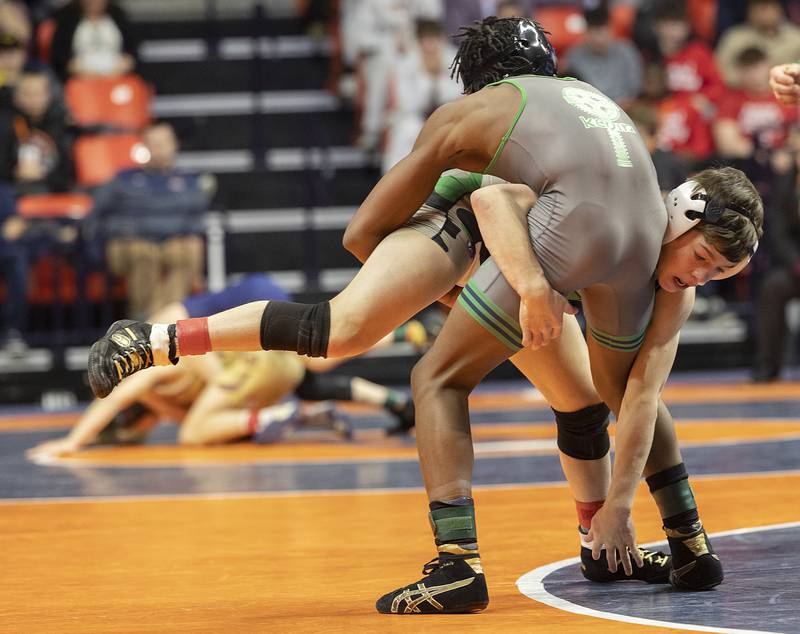 Grays Lake Central’s Vince DeMarco (right) and Ray Long of Niles Notre Dame compete in the 106 pound weight class of the 2A state individual wrestling finals Saturday, Feb. 22, 2025, at State Farm Center in Champaign.