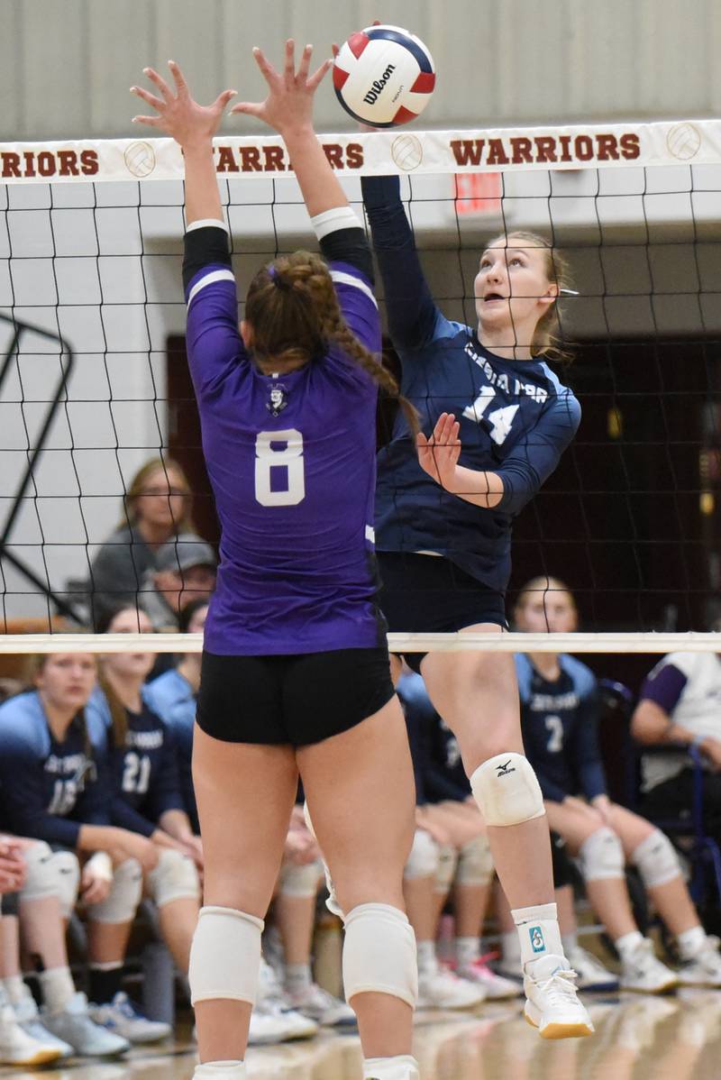 Cissna Park's Annika Stadeli, right, sends a hit past Lexington's Avery Poppe during the IHSA Class 1A Watseka Sectional championship Thursday, Nov. 6, 2025.
