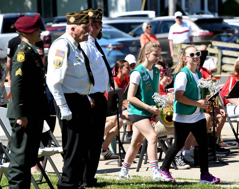 Girl Scouts placed flowers at graves during Oregon's Memorial Day Service on Monday, May 25, 2026 at the Riverside Cemetery.