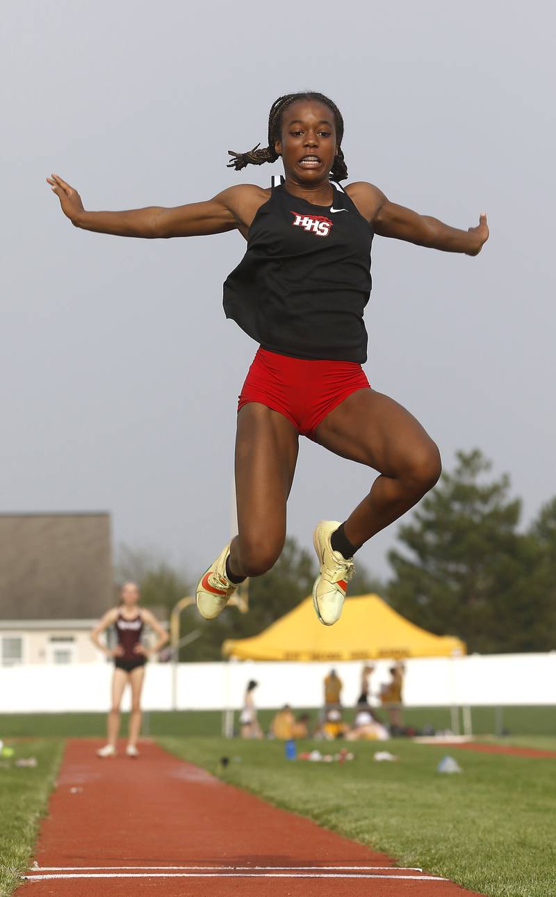 Huntley’s Alex Johnson competes in the long jump during the IHSA Class 3A Huntley Girls Track Sectional Wednesday,  May 11, 2022, at Huntley High School.