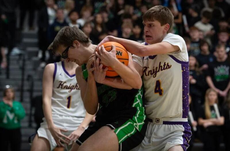 Bishop McNamara's Callaghan O'Connor and Chicago Christian's Eddie VanDellen, right, try to control the ball during Friday's game at McNamara.