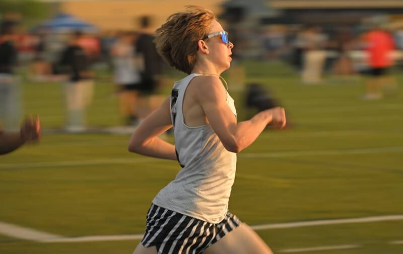 Kaneland’s Joey Schuch leads his heat of the 800-meter run at the Class 3A Metea Valley boys sectional track and field meet in Napeville on Thursday, May 16, 2024.