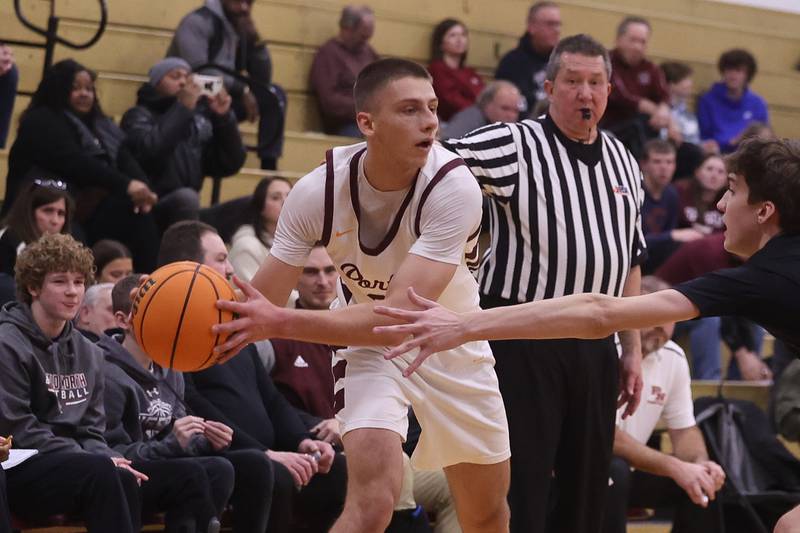 Lockport’s Anthony Kosi looks for a play against Plainfield North on Friday, Jan. 3, 2025 in Lockport