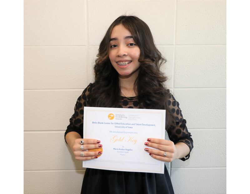 Washington Junior High eighth grade student Maria Avalos Angeles received a Gold Key award in the Scholastic Art and Writing Midwest Region competition. Her winning entry was a poem titled “No Hablo Inglés”.