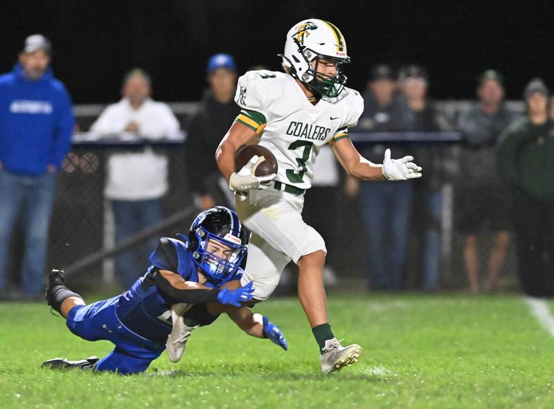 Coal City's Jonathan Widlowski returns a punt during a conference game against Peotone on Friday, Sep 27, 2024 at Peotone. (Dean Reid for Shaw Local News)