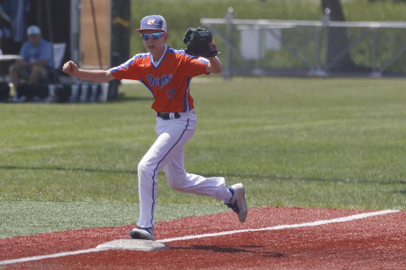 Windy City Hit Dog’s —Offdenkamp’s  Andrew Offdenkamp steps on third base for the force out to end the inning during a semi-final baseball game against The Barrington Broncos Red in a Under 13 McHenry County Youth Sports Association’s Summer International Championship baseball tournament on Monday, July 14, 2025, at the Mickey Sund Baseball Complex in Crystal Lake's Lippold Park.