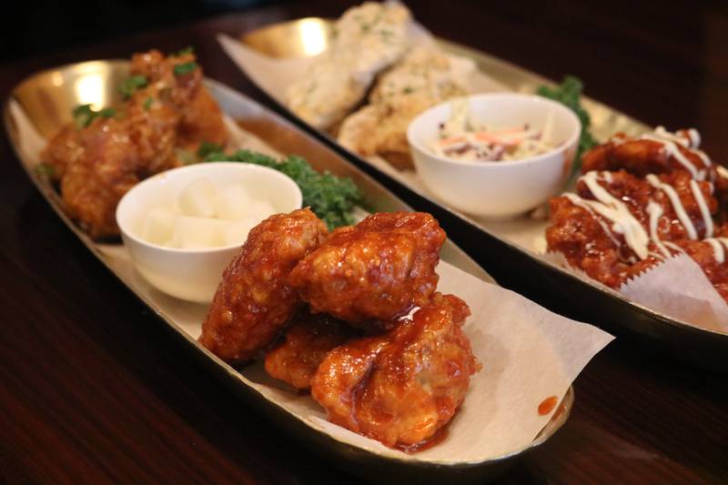 Korean fried chicken from Omi Sushi in DeKalb comes in a variety of flavors, including plain, magic sprinkle, soy garlic, sweet and mild, and supreme or hot. Omi Sushi in DeKalb is pictured March 13, 2023.