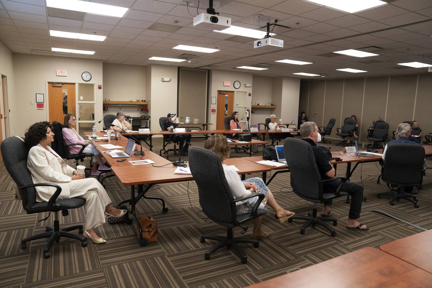 Members of the McHenry County Mental Health Board listen during a presentation on fentanyl overdoses in McHenry County by Ryan Sachs, epidemiology program coordinator for the McHenry County Department of Health and Laura Crain, program coordinator for the McHenry County Substance Abuse Coalition on Tuesday, July 26, 2022. Ryan Rayburn for Shaw Local