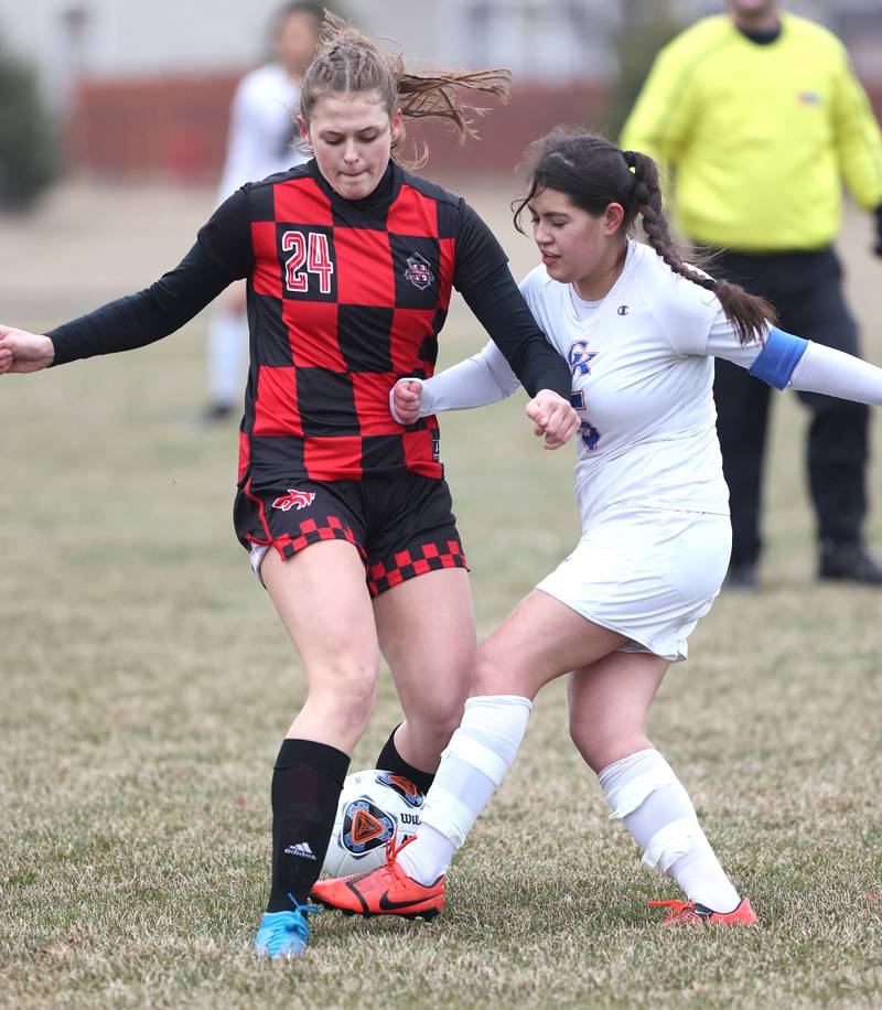 Indian Creek's Audrey Witte (left) and Genoa-Kingston's Maria Cristina Tinajero fight for possession during their game Thursday, March 16, 2023, at Pack Park Sports Complex in Waterman.