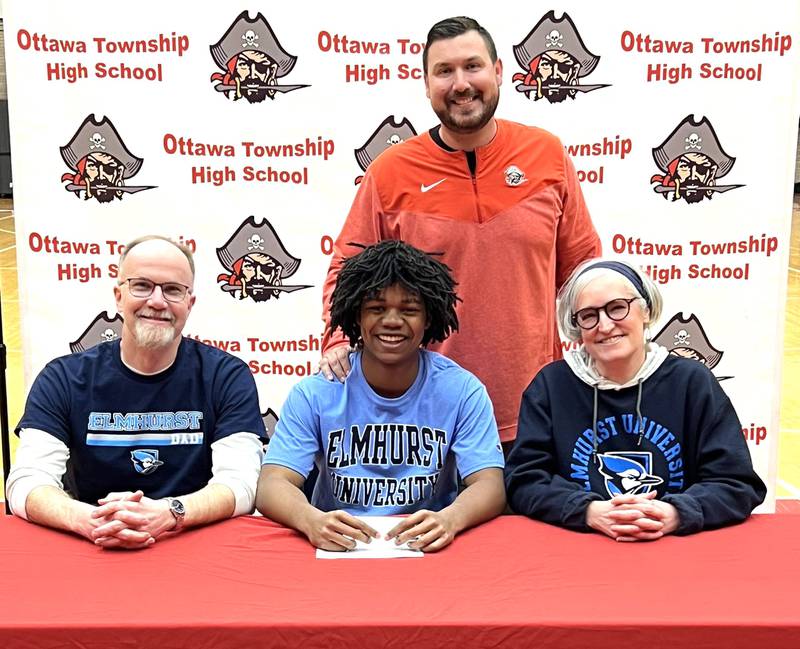 Ottawa’s Colby Mortenson has signed on to continue his education at Elmhurst University and his football career at the NCAA Division III level with the Bluejays. Mortenson, a quarterback for the Pirates and a first-team member of the 2023 Times All-Area Football Team, is pictured seated at his signing ceremony bookended by family, with Ottawa football coach Chad Gross standing behind.
