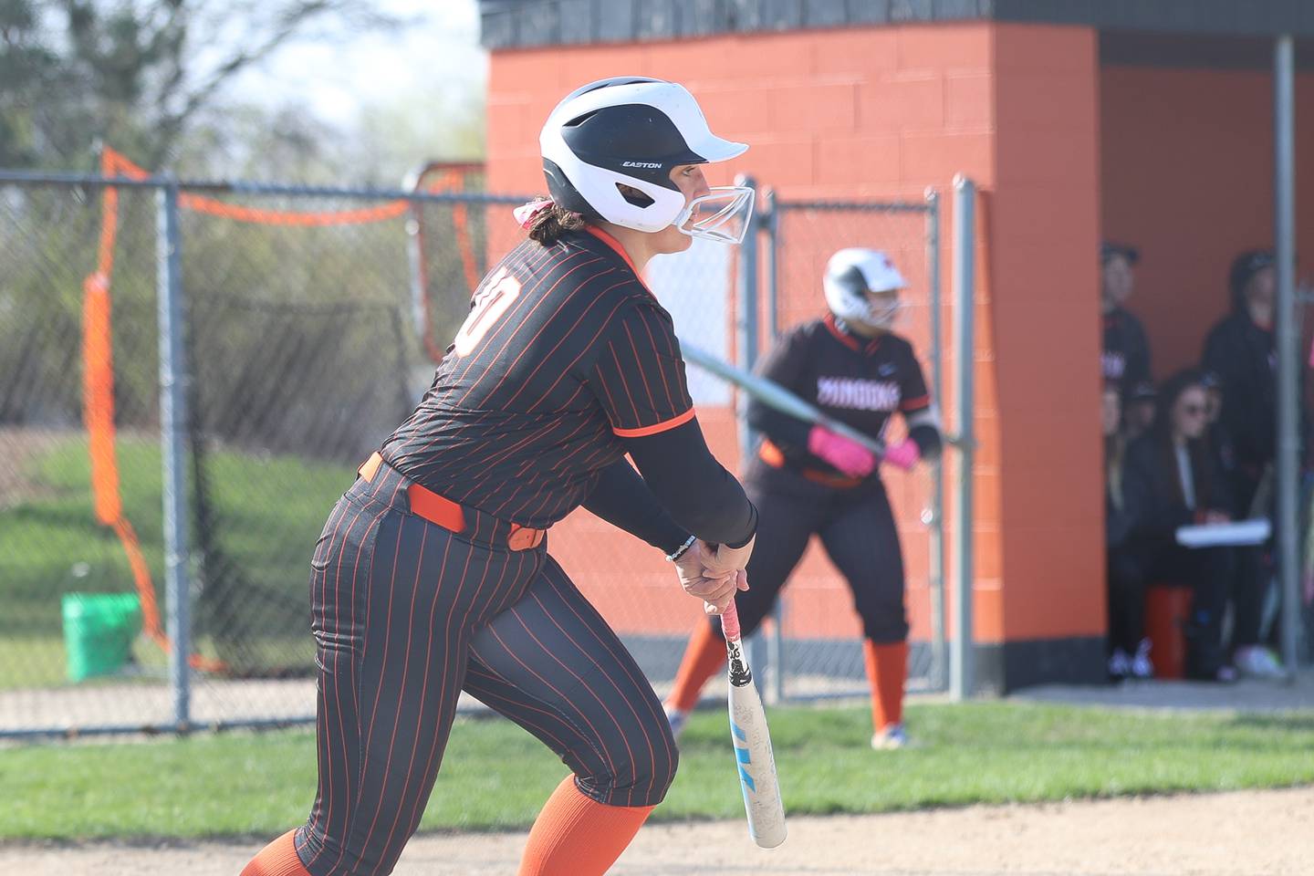 Minooka’s Addisonn Crumly drives in two runs against Joliet Catholic on Tuesday, April 7, 2026 in Minooka.
