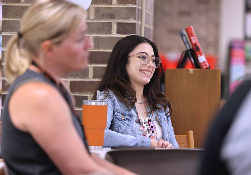 Viviana Castillo, a teacher at Cortland Elementary School, talks Monday, May 22, 2023, at Huntley Middle School in DeKalb, about what the Northern Illinois University psychologist program means to her and how it will help her and other participants achieve their goals.