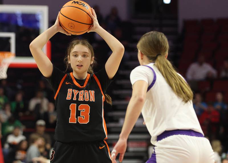Byron's Brynn Green looks to pass the ball off around Breese Centra's Ella Nettemeier during the Class 2A title game on Saturday, March, 7, 2026 at CEFCU Arena in Normal.