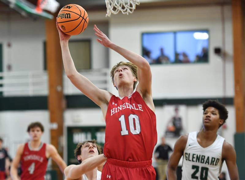 Hinsdale Central’s Tyler Thick lays the ball up during a game against Glenbard West on January 31, 2025 at Glenbard West High School in Glen Ellyn.