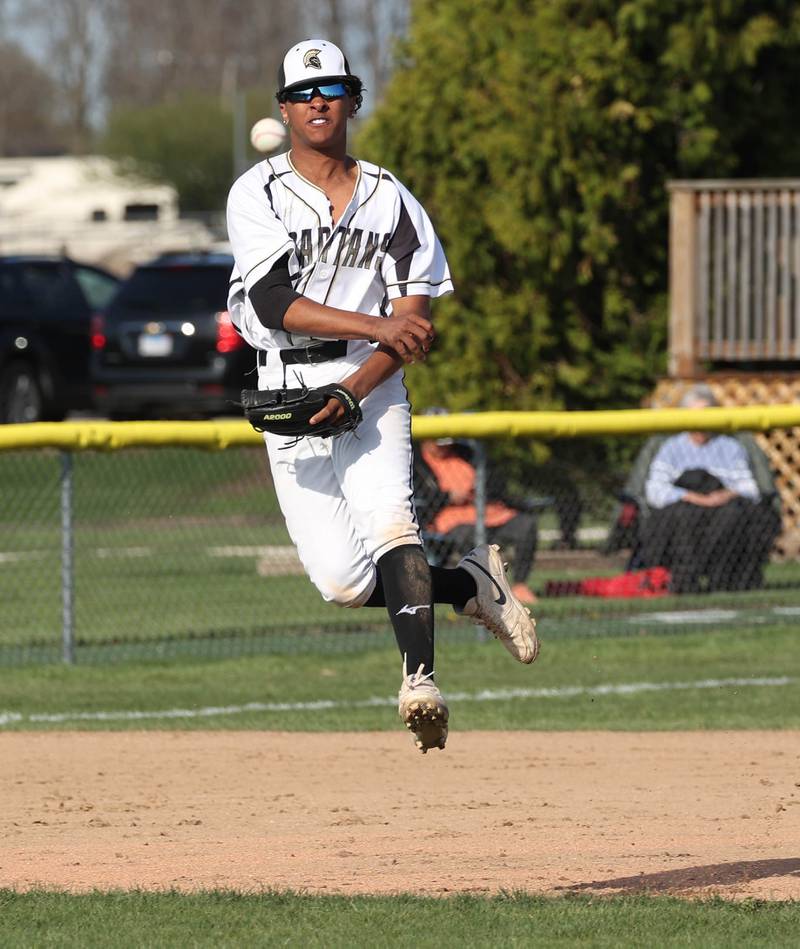 Sycamore's Tyler Townsend throws on the run Wednesday, April 23, 2025, during their game against La Salle-Peru at the Sycamore Community Sports Complex.