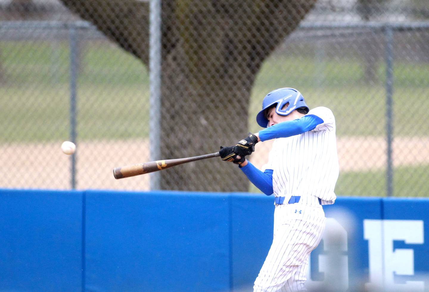 Geneva's Mason Bruesch makes contact during a game against Waubonsie Valley on Wednesday, April 9, 2025 in Geneva.