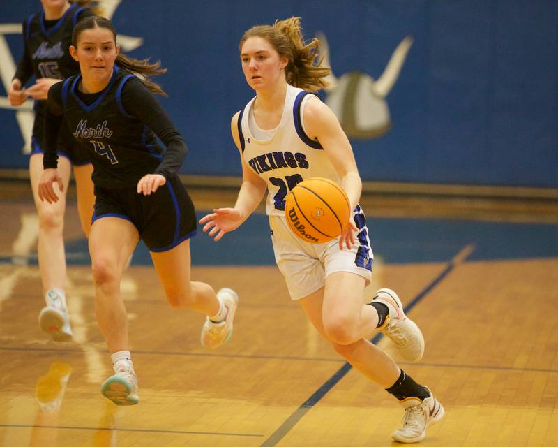 Geneva's Bridget Hecker leads a breakaway against St. Charles North on Friday, Jan. 17,2025 in Geneva.