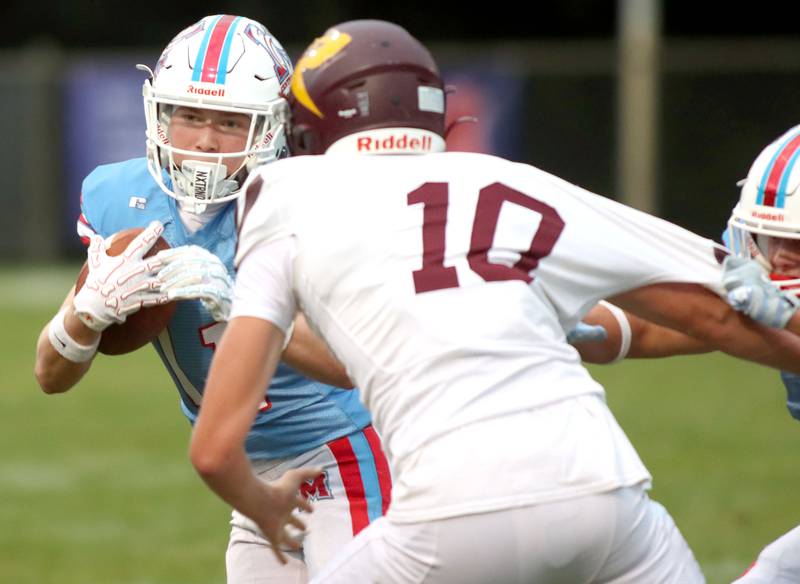 Marian Central’s Max Kinney runs the ball against Richmond-Burton in varsity football at George Harding Field on the campus of Marian Central High School in Woodstock on Friday, August 29, 2025.
