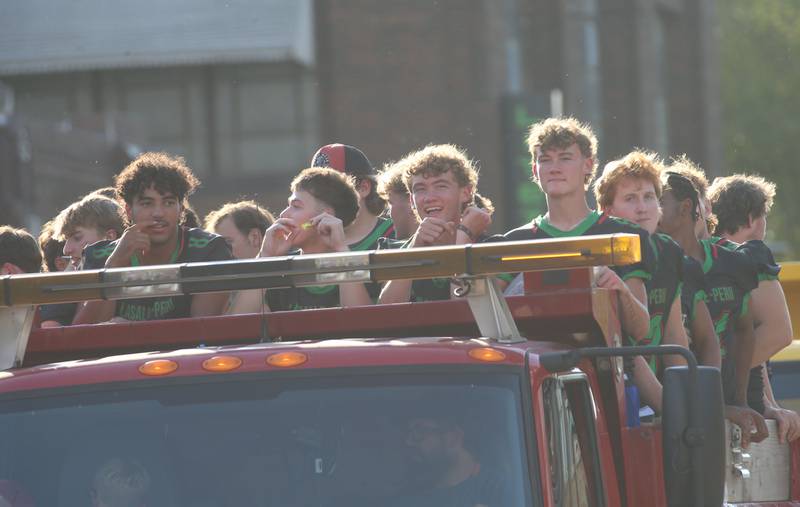 The L-P football team rides during the L-P homecoming parade on Thursday, Oct. 2, 2025 downtown Peru.