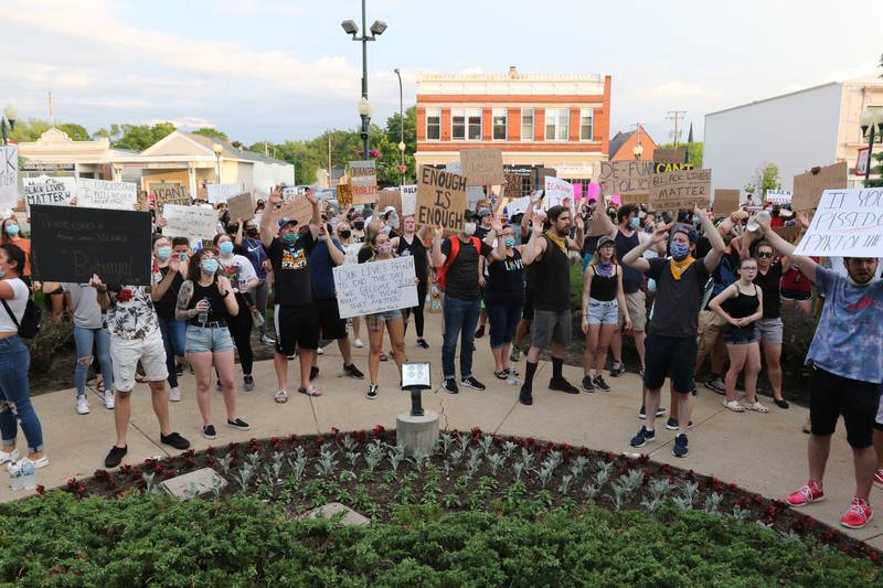 during a protest and march Wednesday in front of the DeKalb County Courthouse in Sycamore. The gathering, which drew several hundred people, was speaking out against police brutality and the recent death of George Floyd.