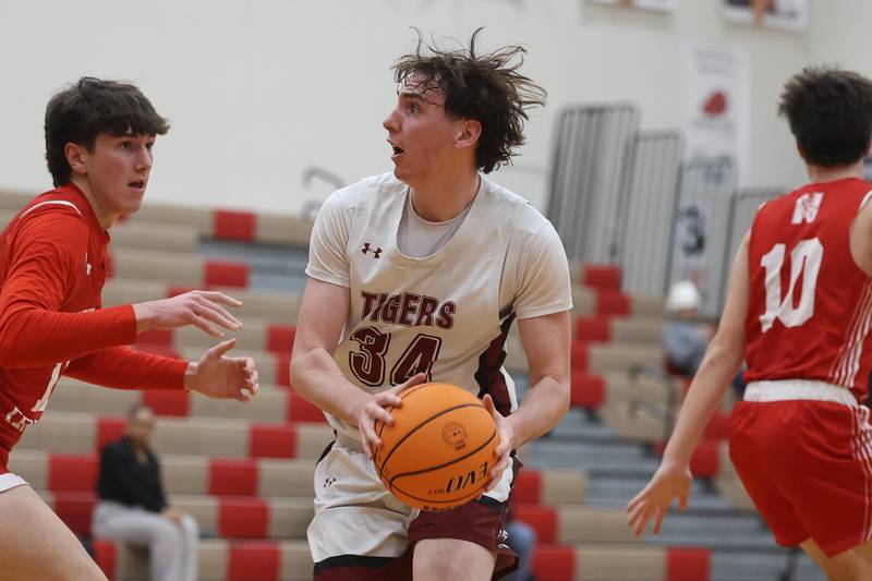 Plainfield North’s Quintin Wiencek works to the basket against Naperville Central on Wednesday, Jan 22, 2025 in Plainfield.