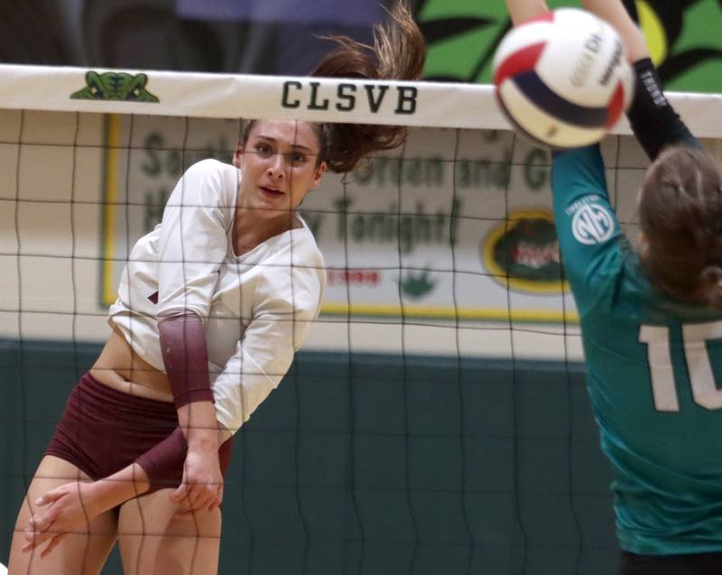 Prairie Ridge’s Maizy Agnello watches her shot sail over the net against Woodstock North in IHSA Class 3A Sectional semifinal volleyball action on Tuesday, Nov. 5, 2024, at  Crystal Lake South High School  in Crystal Lake.